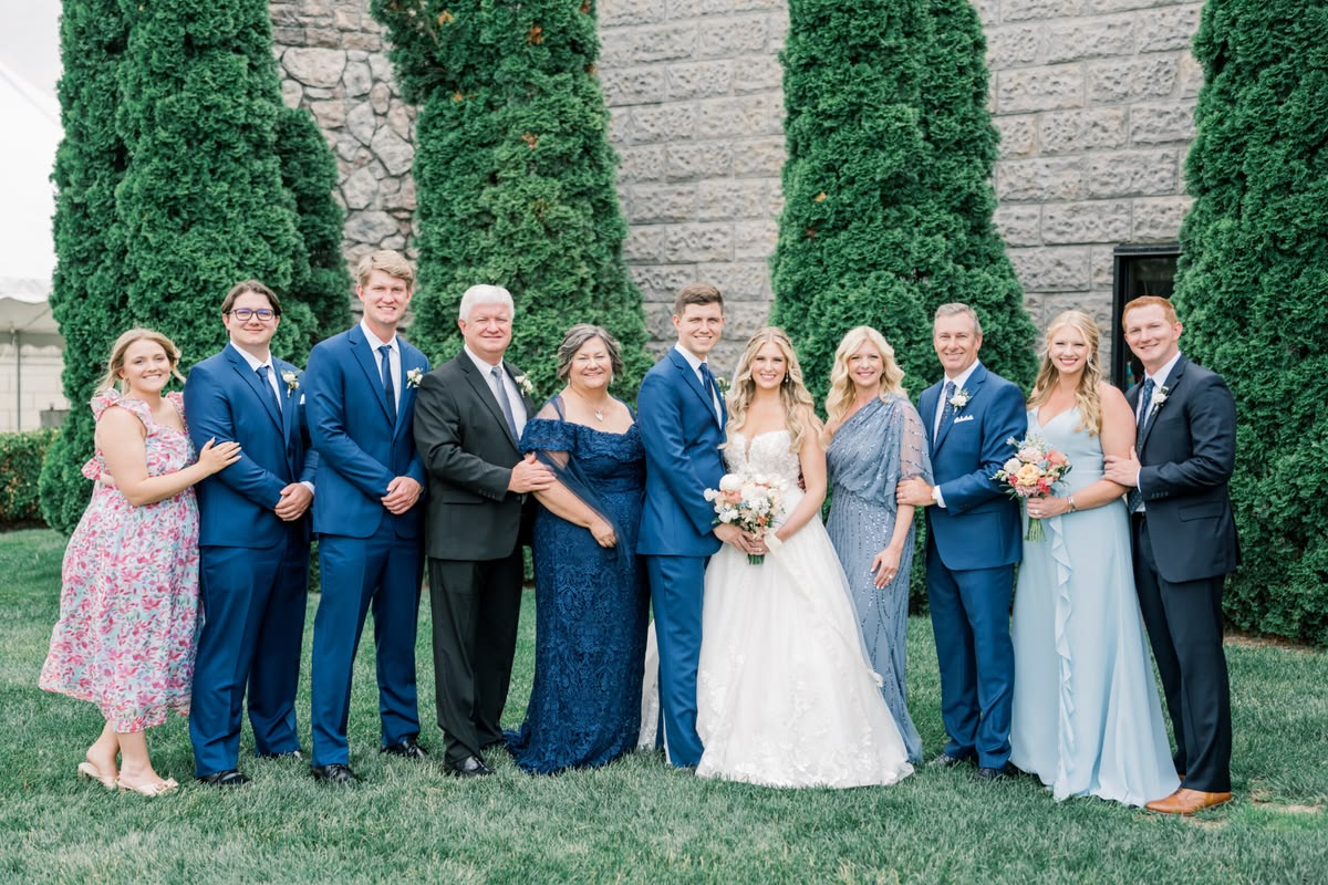 Family wedding photo in blue formal wear Halem