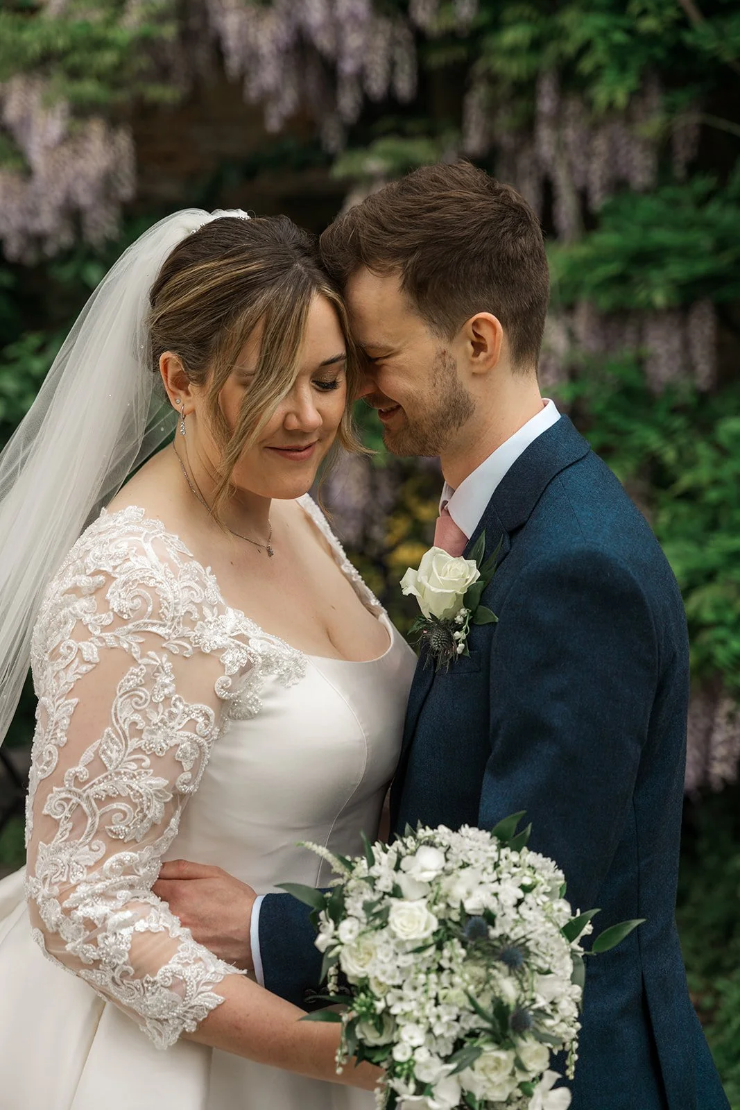 Bride and groom sharing a tender moment. Halem