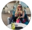 Woman sitting outside with a drink Halem